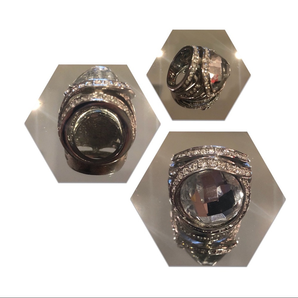 Silver ring with large stone.